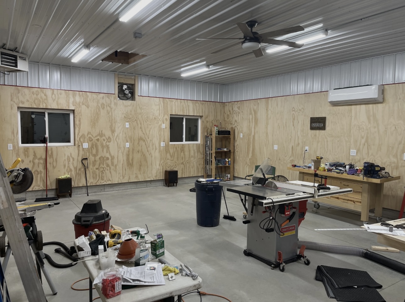 Workshop interior with mini-split head unit mounted on the wall